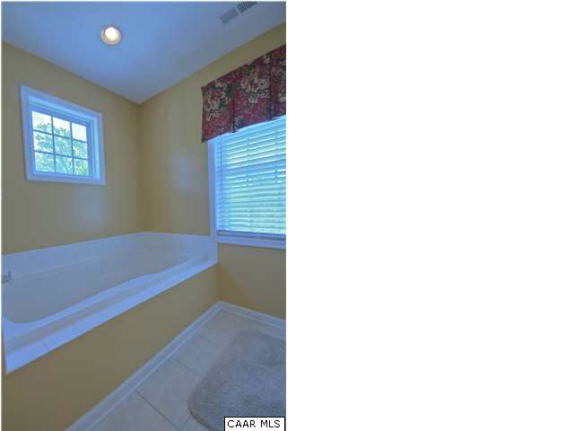913 Raymond Road Charlottesville, VA 22902 - Photo 14 of 31 a picture of a room with windows