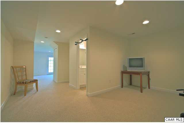 913 Raymond Road Charlottesville, VA 22902 - Photo 25 of 31 a room with a table and chairs