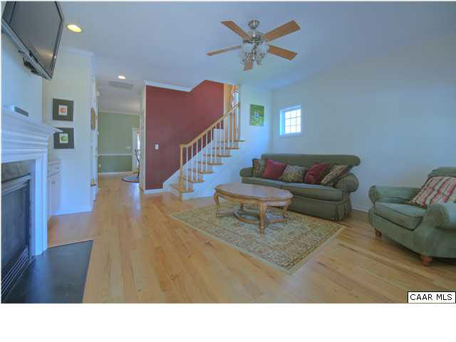 913 Raymond Road Charlottesville, VA 22902 - Photo 3 of 31 a living room with furniture and a wooden floor