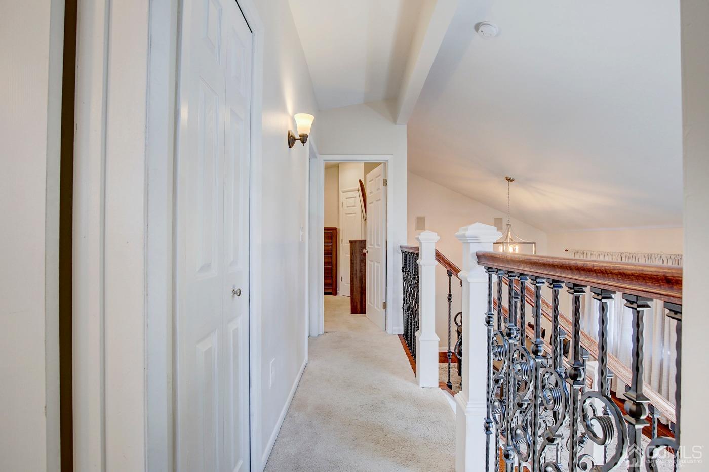 5 Thomas Street Old Bridge, NJ 08857 - Photo 19 of 36 a view of a hallway with wooden floor and staircase