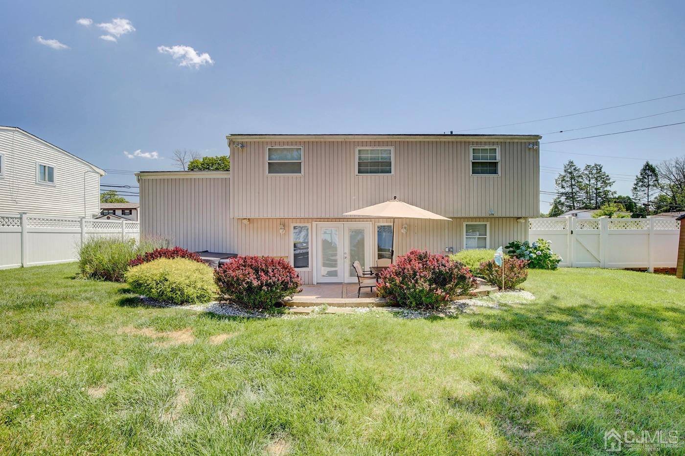 5 Thomas Street Old Bridge, NJ 08857 - Photo 29 of 36 a front view of a house with garden