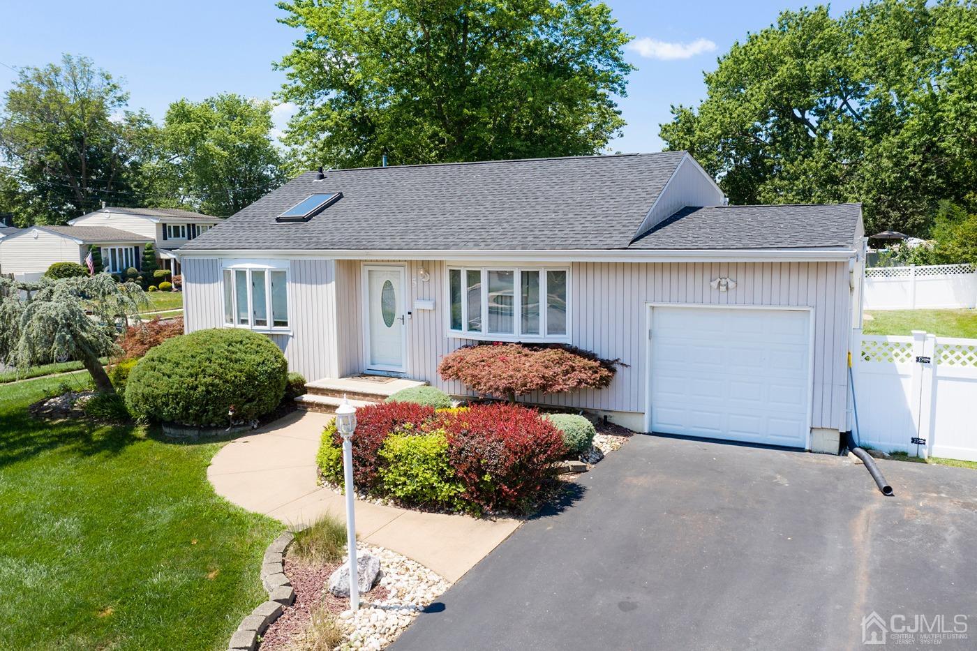5 Thomas Street Old Bridge, NJ 08857 - Photo 4 of 36 a front view of a house with garden