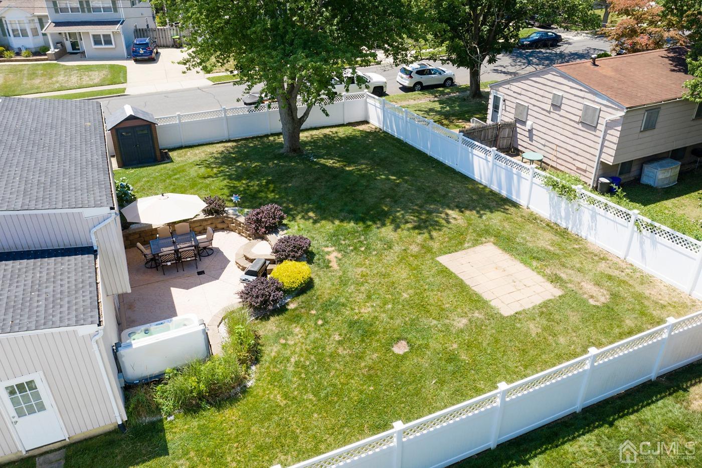 5 Thomas Street Old Bridge, NJ 08857 - Photo 34 of 36 a swimming pool with outdoor seating and yard