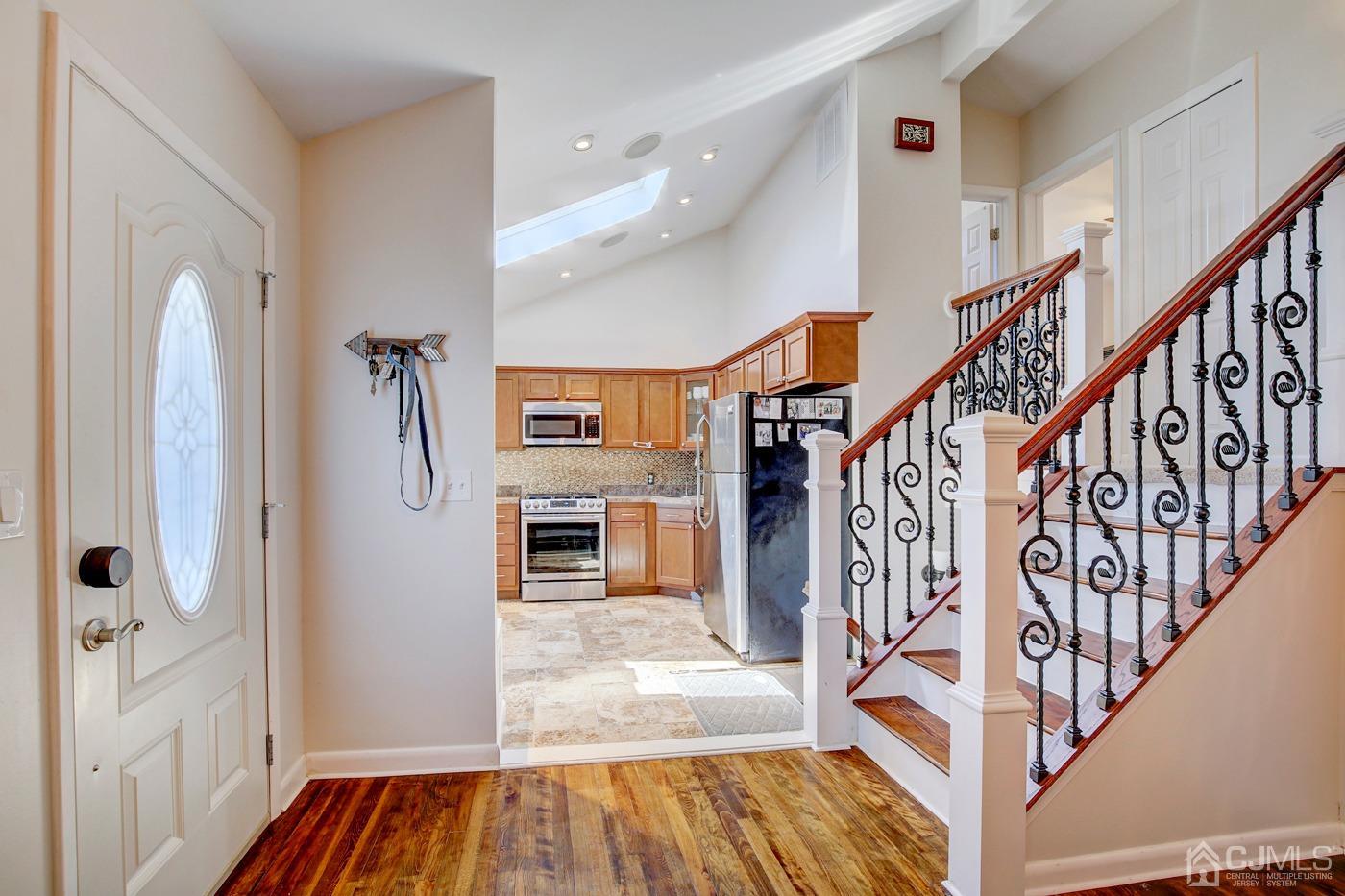 5 Thomas Street Old Bridge, NJ 08857 - Photo 5 of 36 a view of entryway and hall with wooden floor