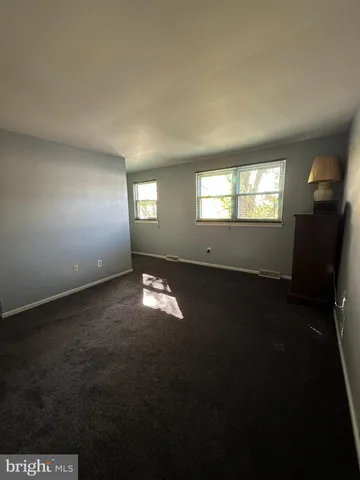 a room with furniture and window