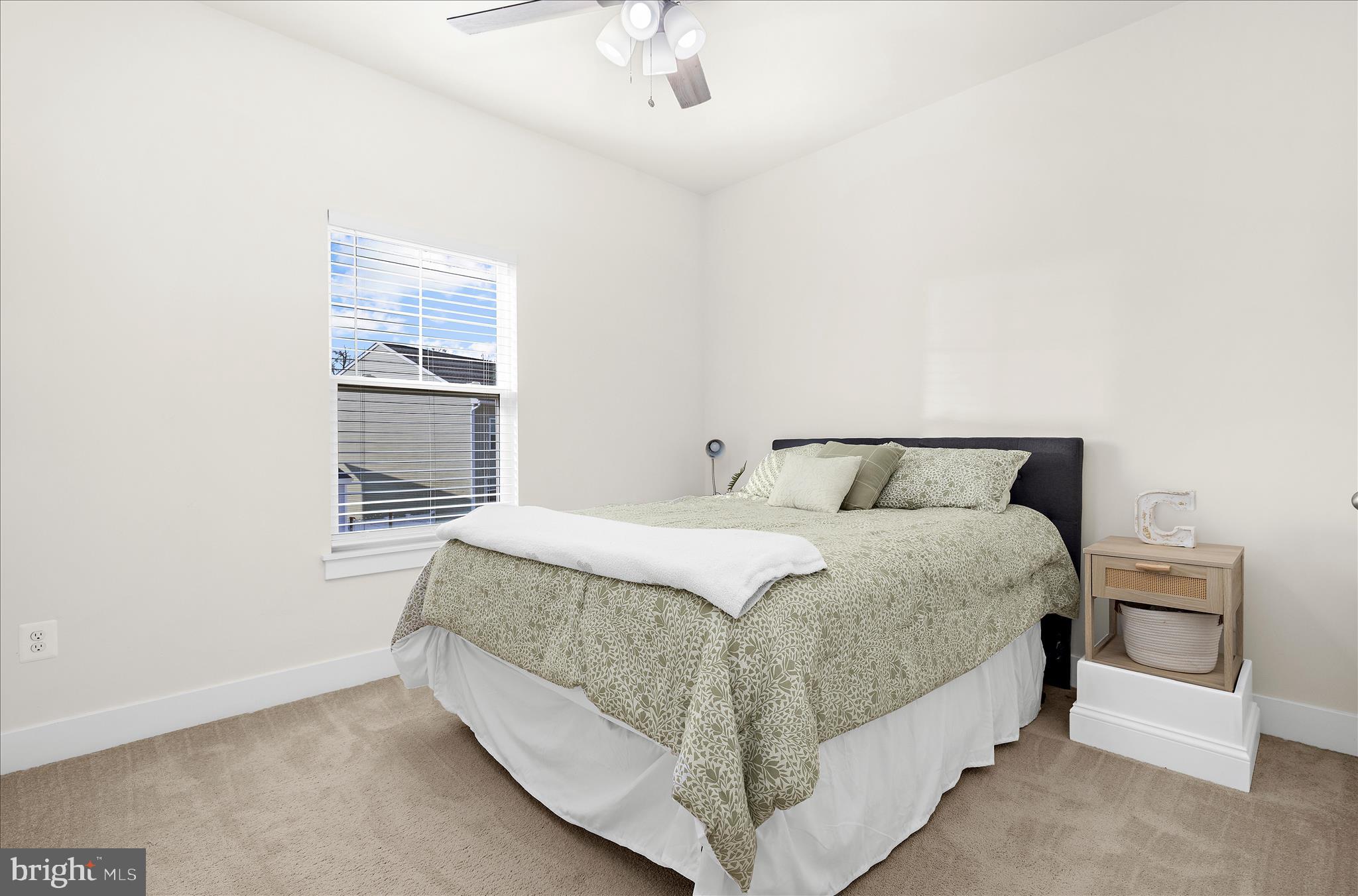 211 Harvest Blossom Road Millersville, MD 21108 - Photo 27 of 87 a spacious bedroom with a bed and a window