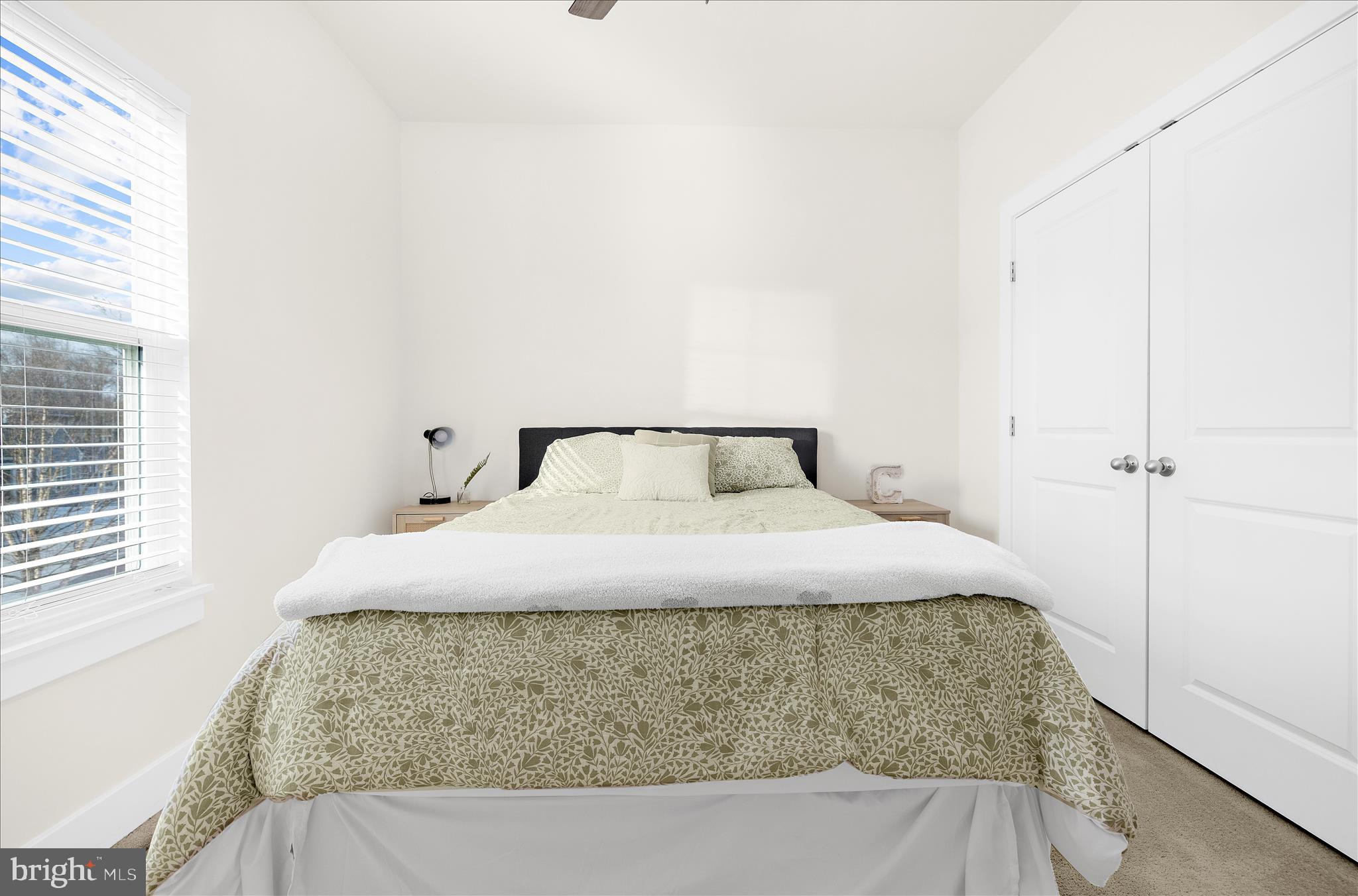 211 Harvest Blossom Road Millersville, MD 21108 - Photo 28 of 87 a bedroom with a bed and a window
