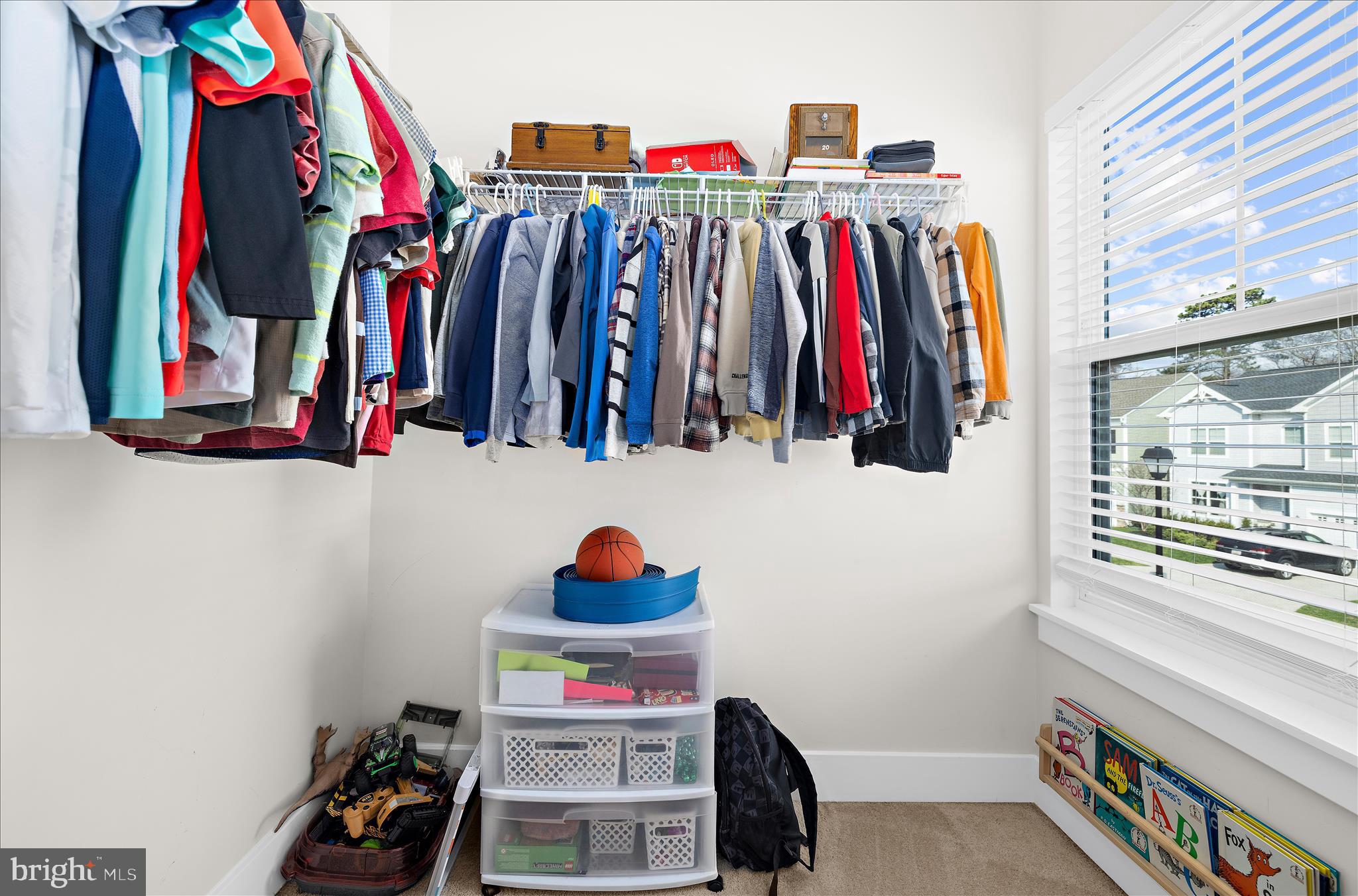 211 Harvest Blossom Road Millersville, MD 21108 - Photo 40 of 87 a view of walk in closet with clothes and shoes