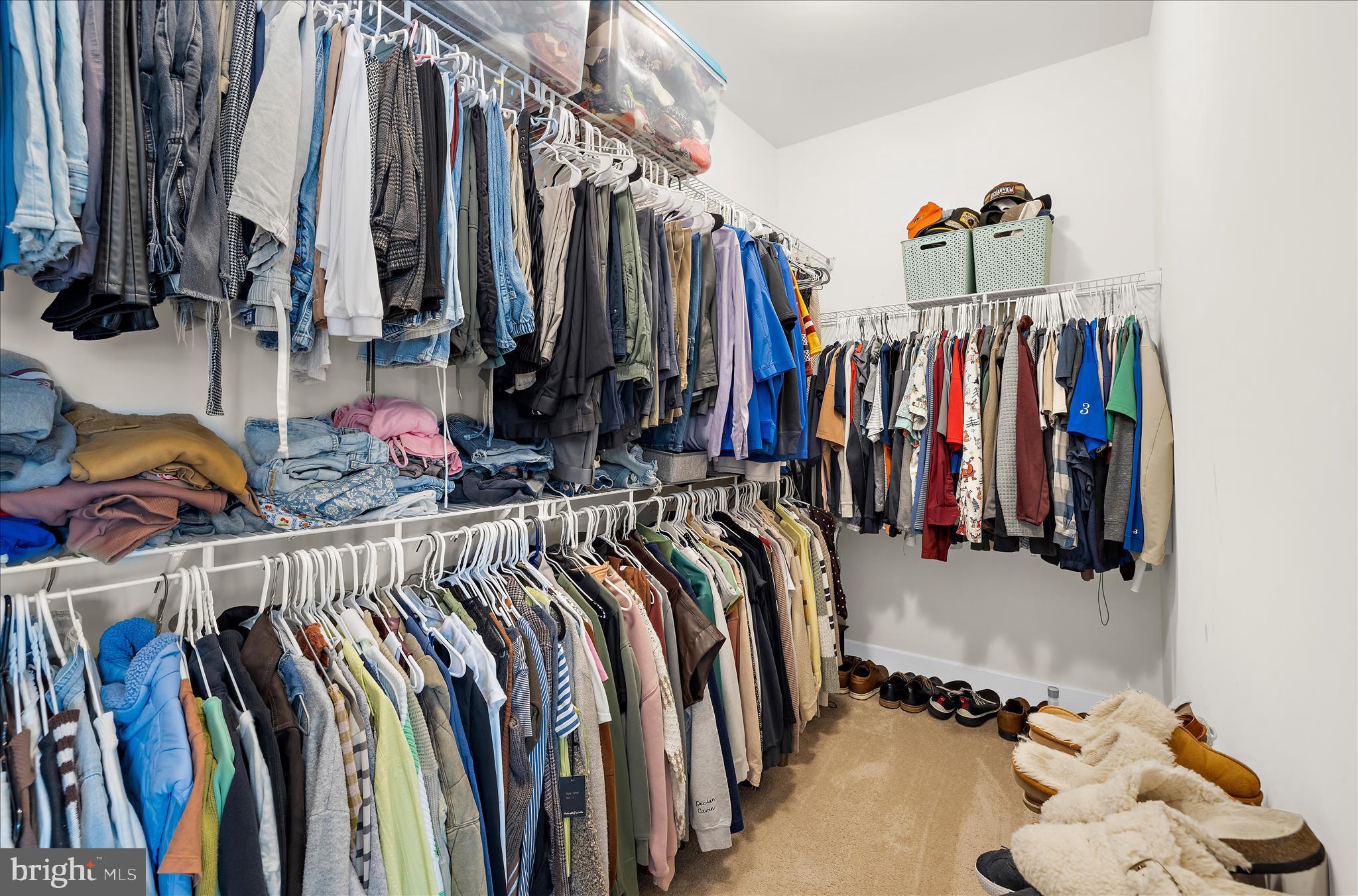 211 Harvest Blossom Road Millersville, MD 21108 - Photo 49 of 87 a view of walk in closet with clothes and shoes