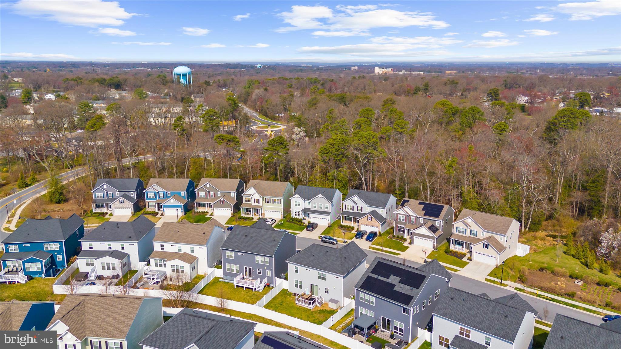 211 Harvest Blossom Road Millersville, MD 21108 - Photo 75 of 87 an aerial view of a houses with a swimming pool