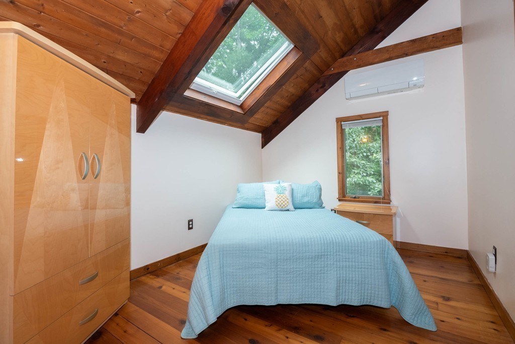 284 Main Street Boxford, MA 01921 - Photo 16 of 25 a bedroom with a bed and a window