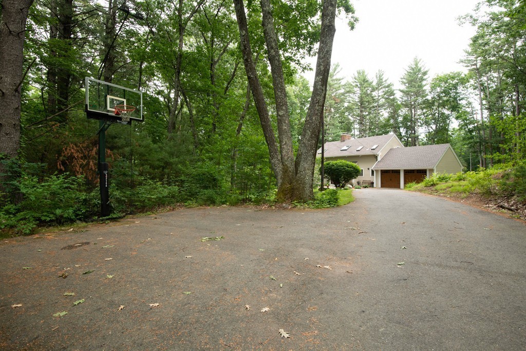 284 Main Street Boxford, MA 01921 - Photo 25 of 25 a front view of a house with a yard and garage