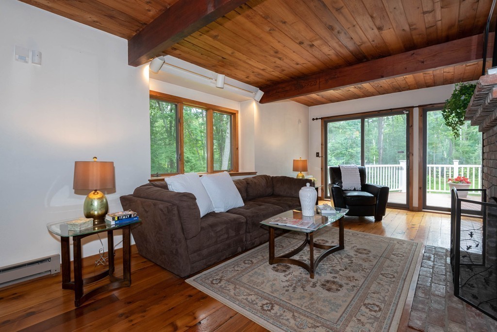 284 Main Street Boxford, MA 01921 - Photo 5 of 25 a living room with furniture and a large window