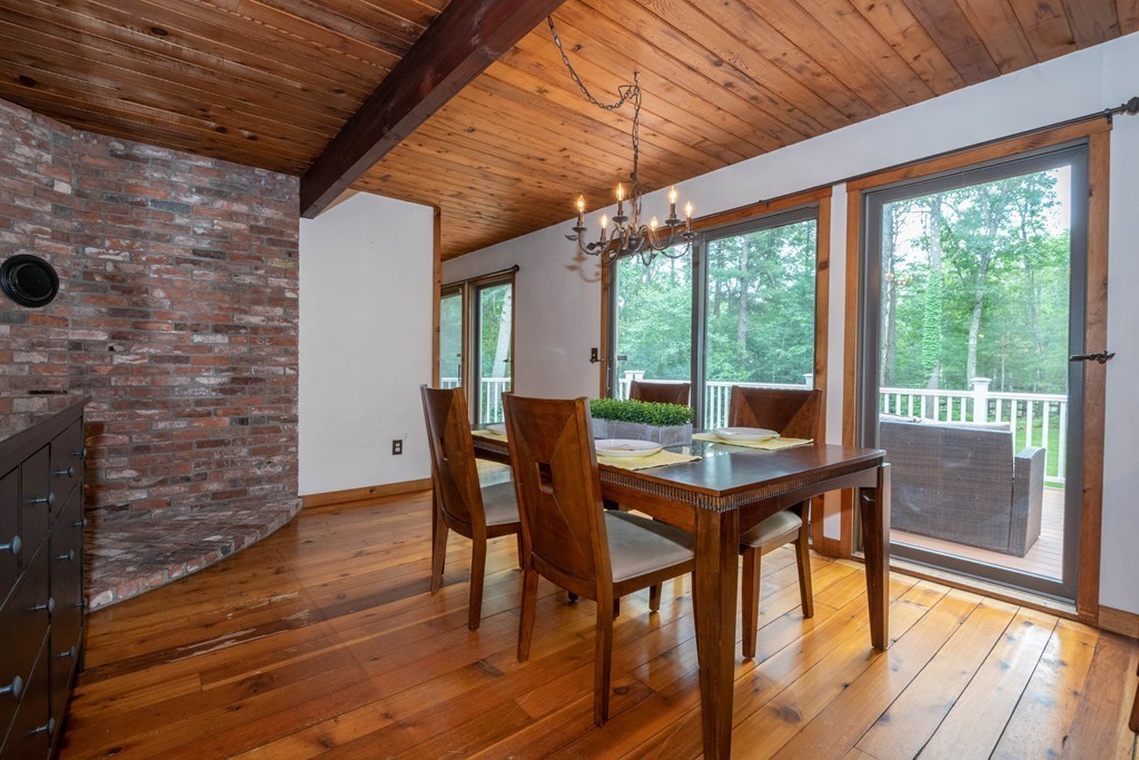 284 Main Street Boxford, MA 01921 - Photo 8 of 25 a view of a dining room with furniture and wooden floor