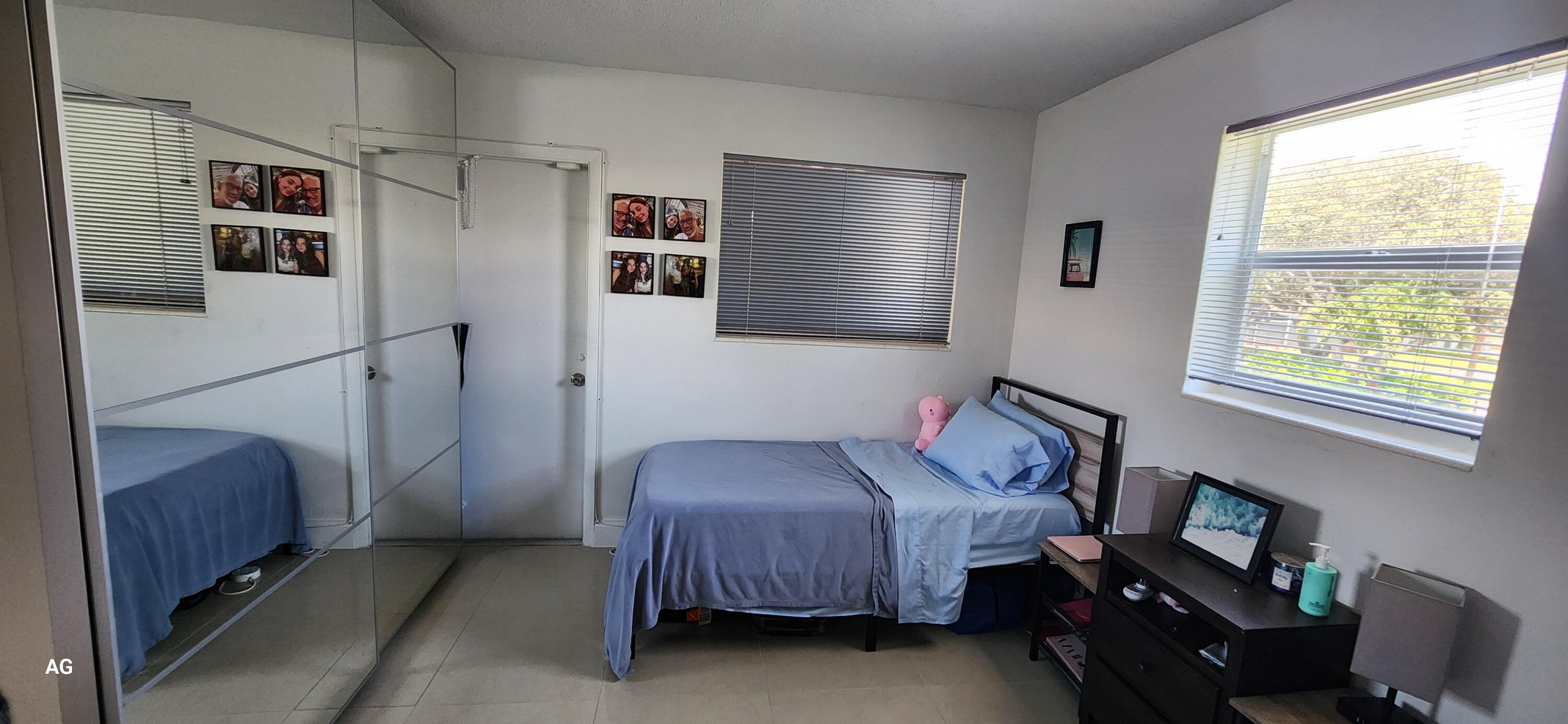 20 Southeast 13th Street, Unit B7 Boca Raton, FL 33432 - Photo 18 of 25 Second Bedroom with exit