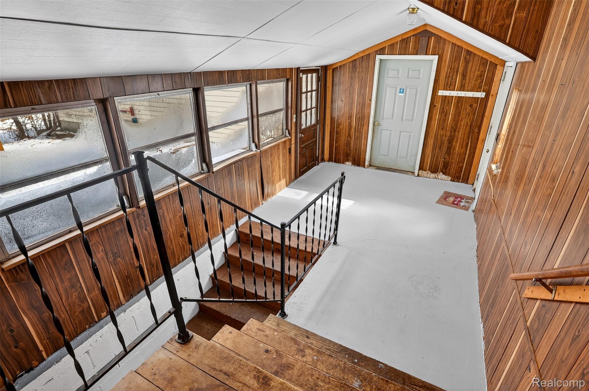 3241 Curtis Road Birch Run, MI 48415 - Photo 31 of 47 Stairway with wood walls