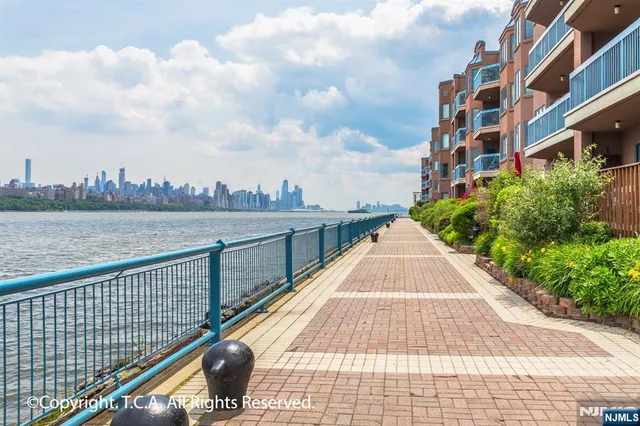a view of buildings from the terrace