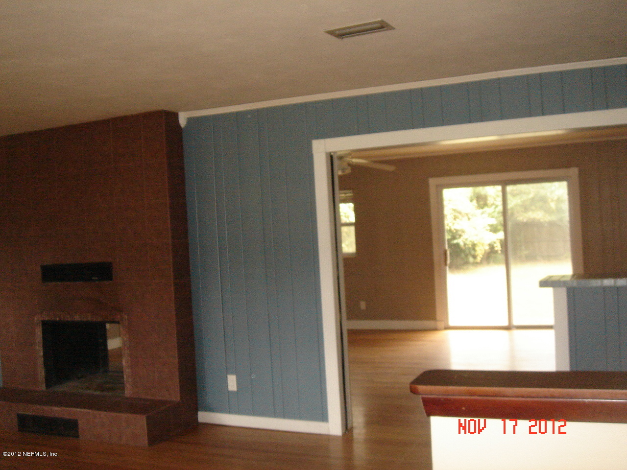423 Ralph Street Orange Park, FL 32073 - Photo 4 of 21 Living Room looking into Family Room