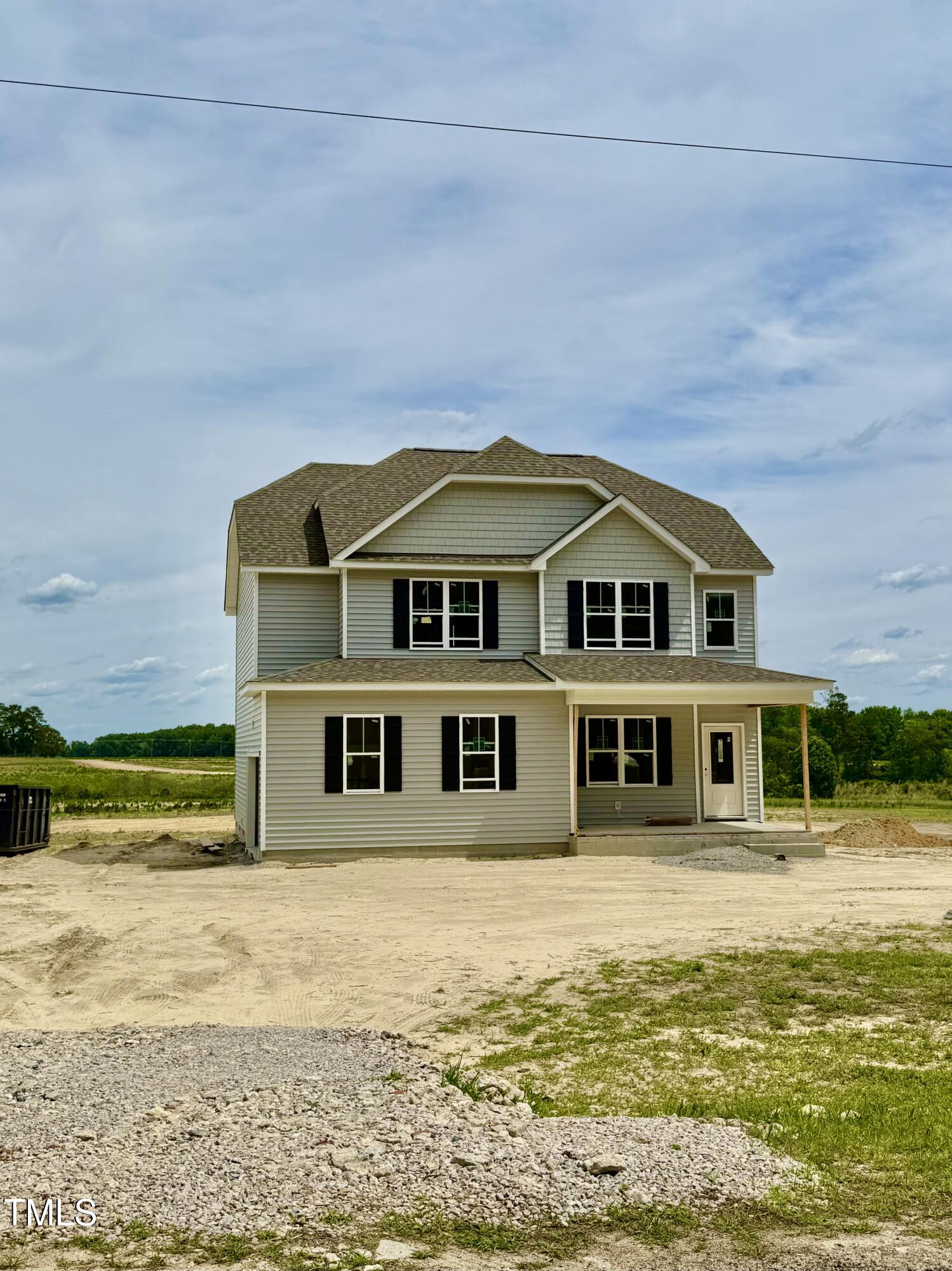6840 Fire Tower Road Bailey, NC 27807 - Photo 2 of 5 a front view of a house with a large pool