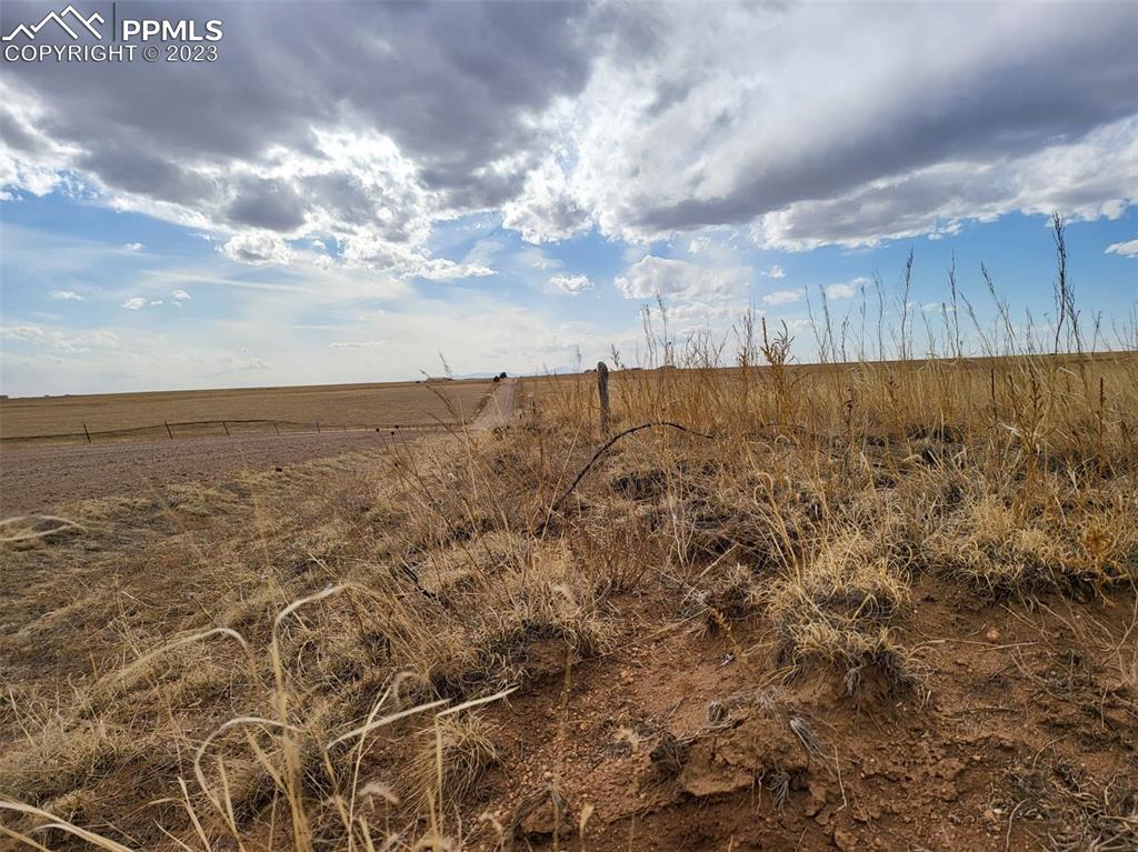 Book Road Yoder, CO 80864 - Photo 14 of 33 a view of a dry yard with wooden fence