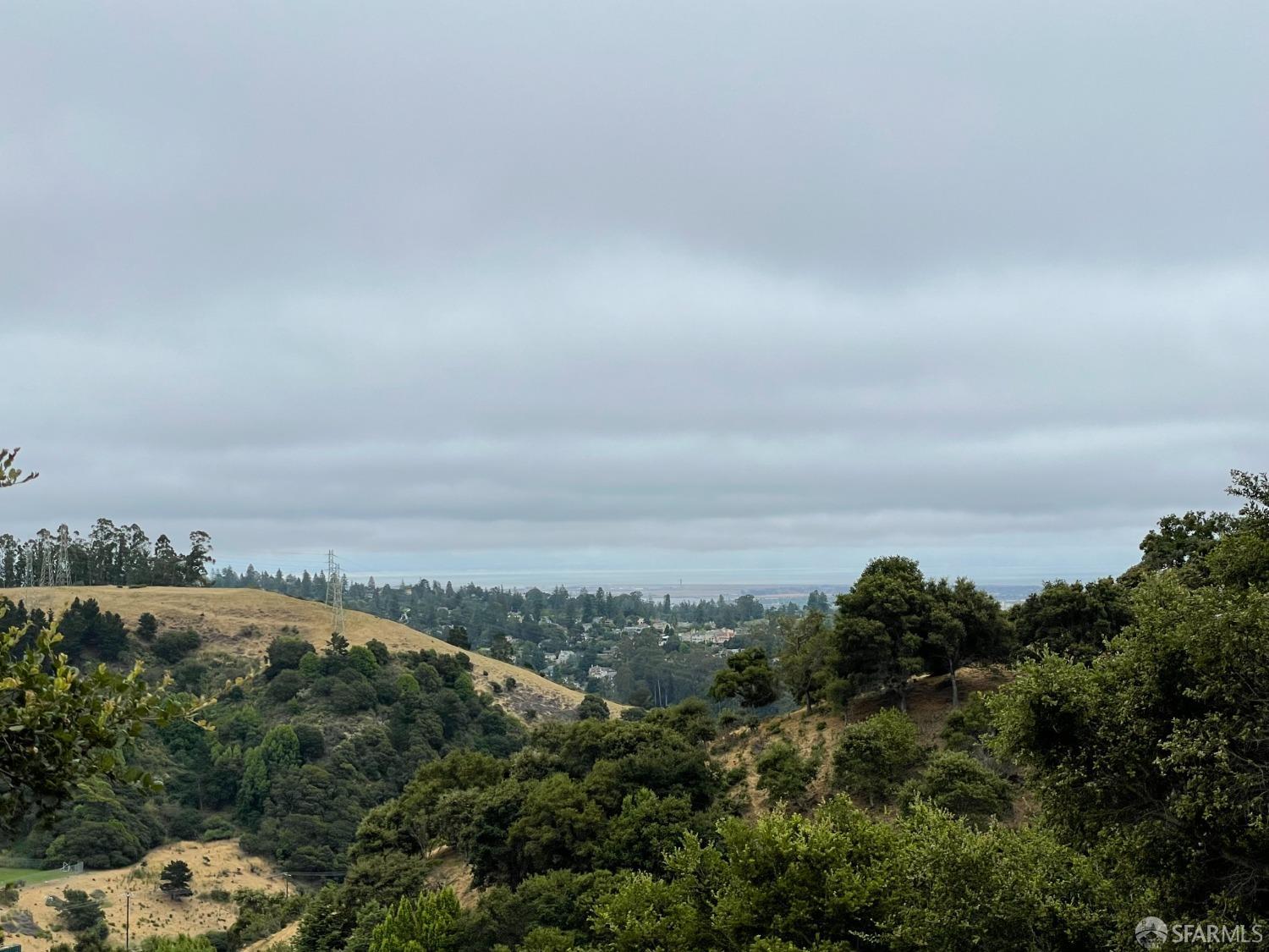 6700 Charing Cross Road Berkeley, CA 94705 - Photo 7 of 13 a view of a lake and mountain in the back