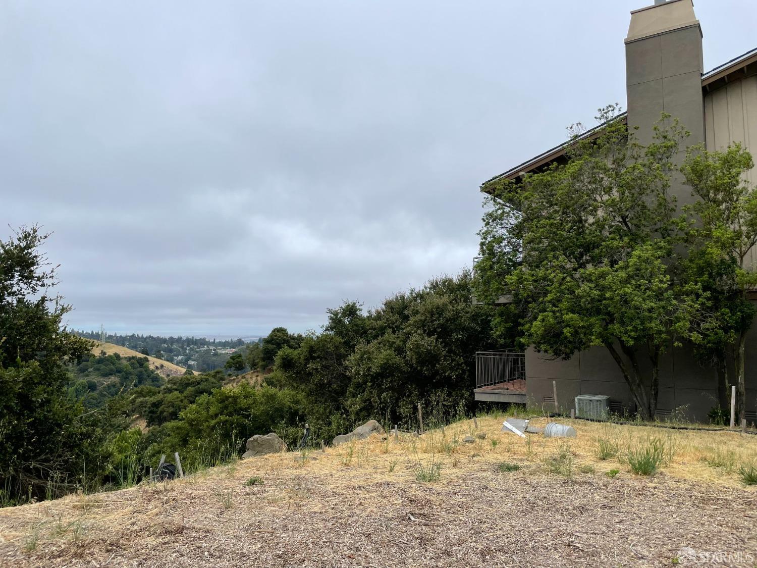 6700 Charing Cross Road Berkeley, CA 94705 - Photo 8 of 13 a street view covered with snow