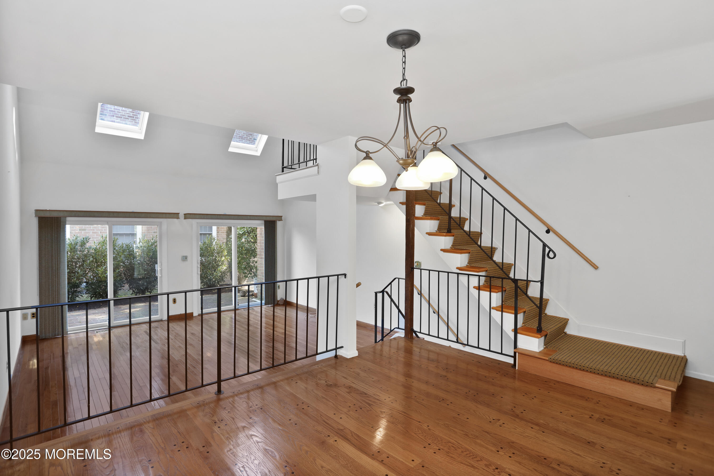 12 Wyckham Road Spring Lake Heights, NJ 07762 - Photo 13 of 39 a view of a hallway with wooden floor and entryway