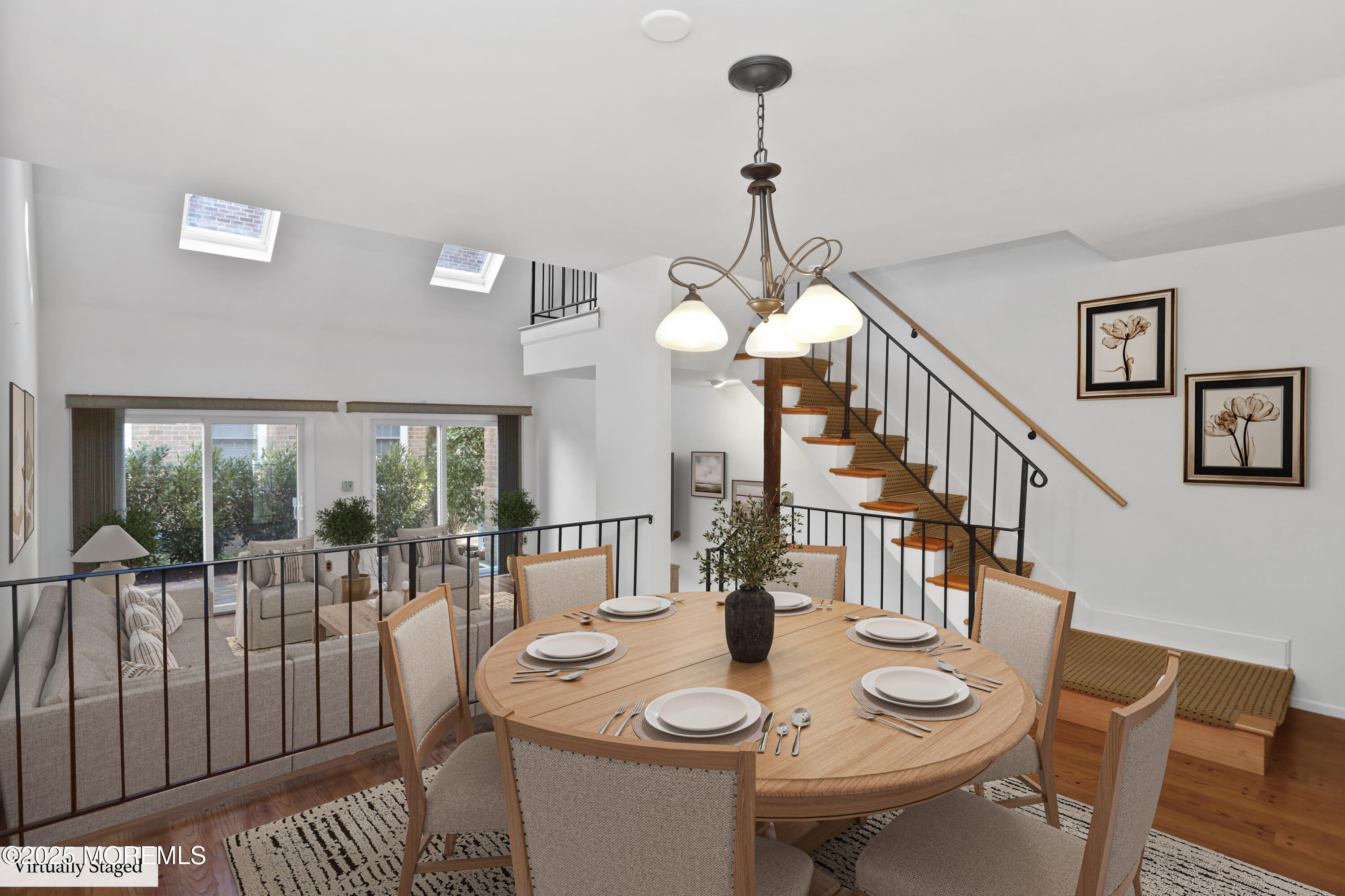 12 Wyckham Road Spring Lake Heights, NJ 07762 - Photo 14 of 39 a view of a dining room with furniture wooden floor and chandelier
