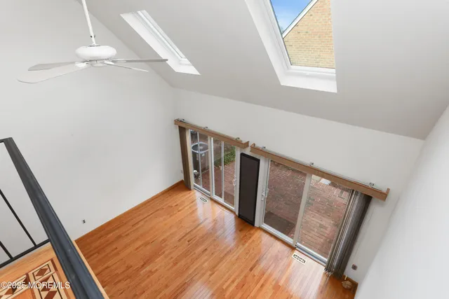 a view of empty room with windows