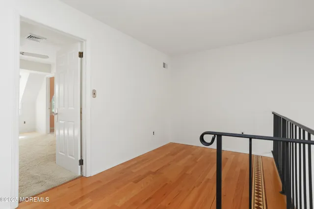 a view of an empty walk in closet