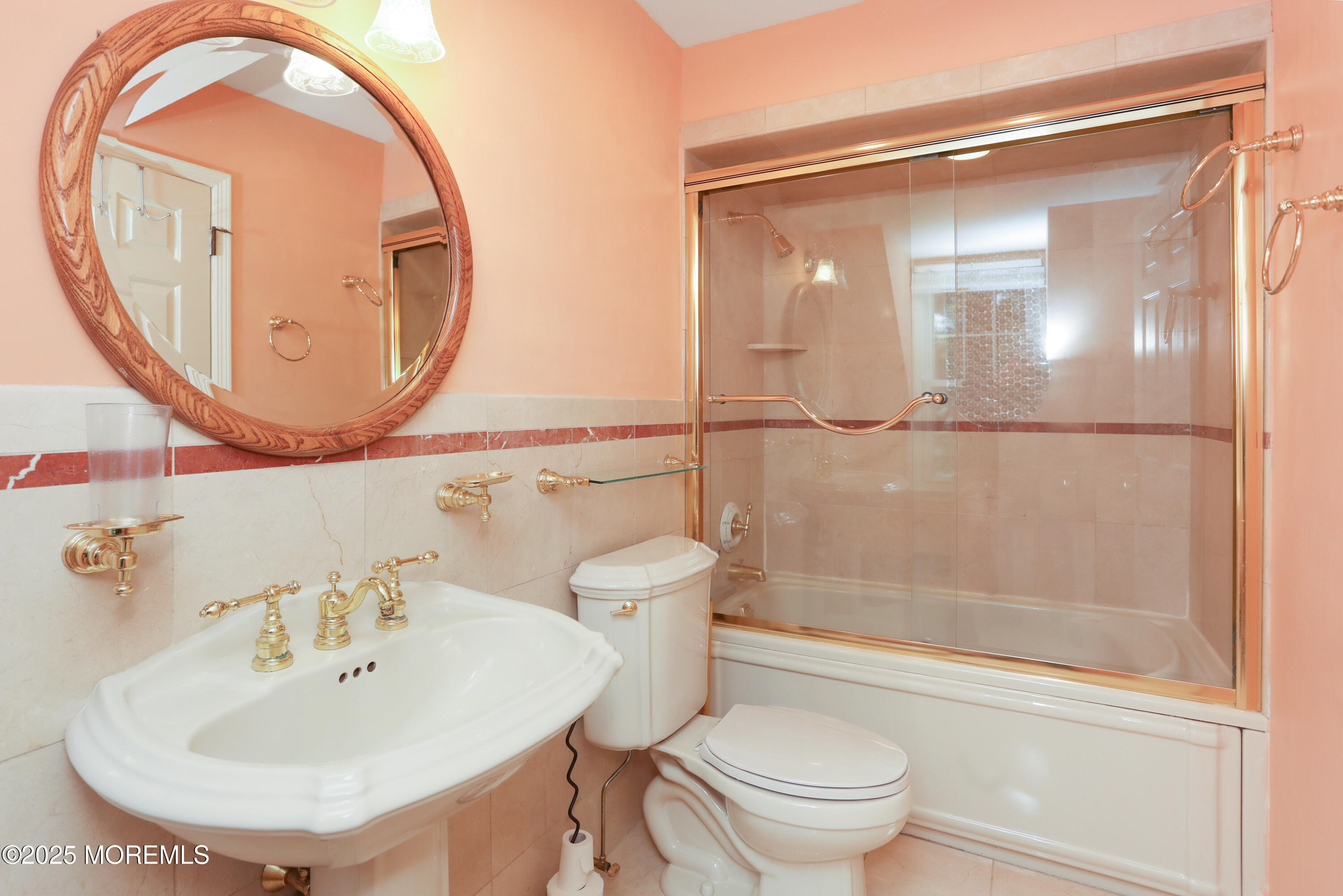 12 Wyckham Road Spring Lake Heights, NJ 07762 - Photo 21 of 39 a bathroom with a sink and a mirror