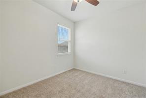 1443 Lk Rdg Drive Brenham, TX 77833 - Photo 12 of 17 an empty room with windows