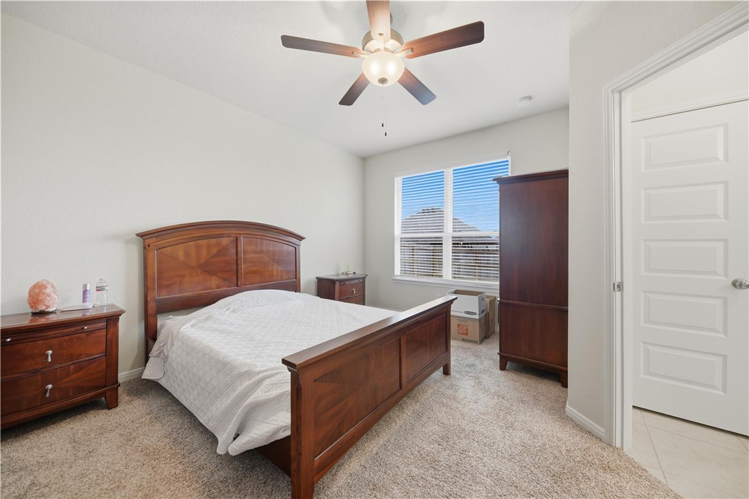 1443 Lk Rdg Drive Brenham, TX 77833 - Photo 15 of 17 a bedroom with a bed and a window