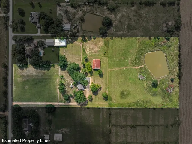 a view of a big yard with an empty space