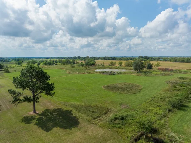 a view of an ocean and a yard