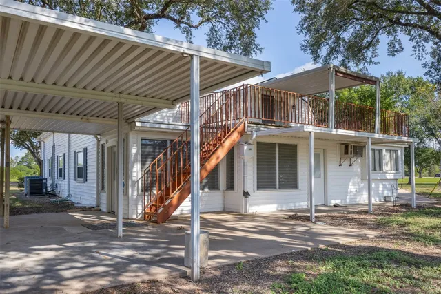 a view of a house with a street