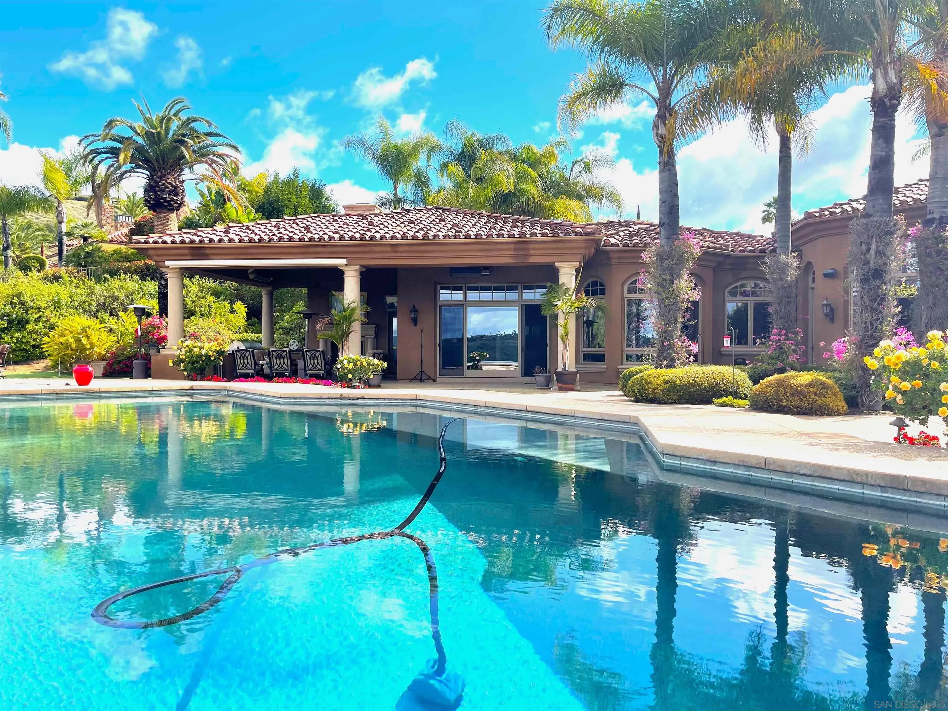 a view of a house with swimming pool