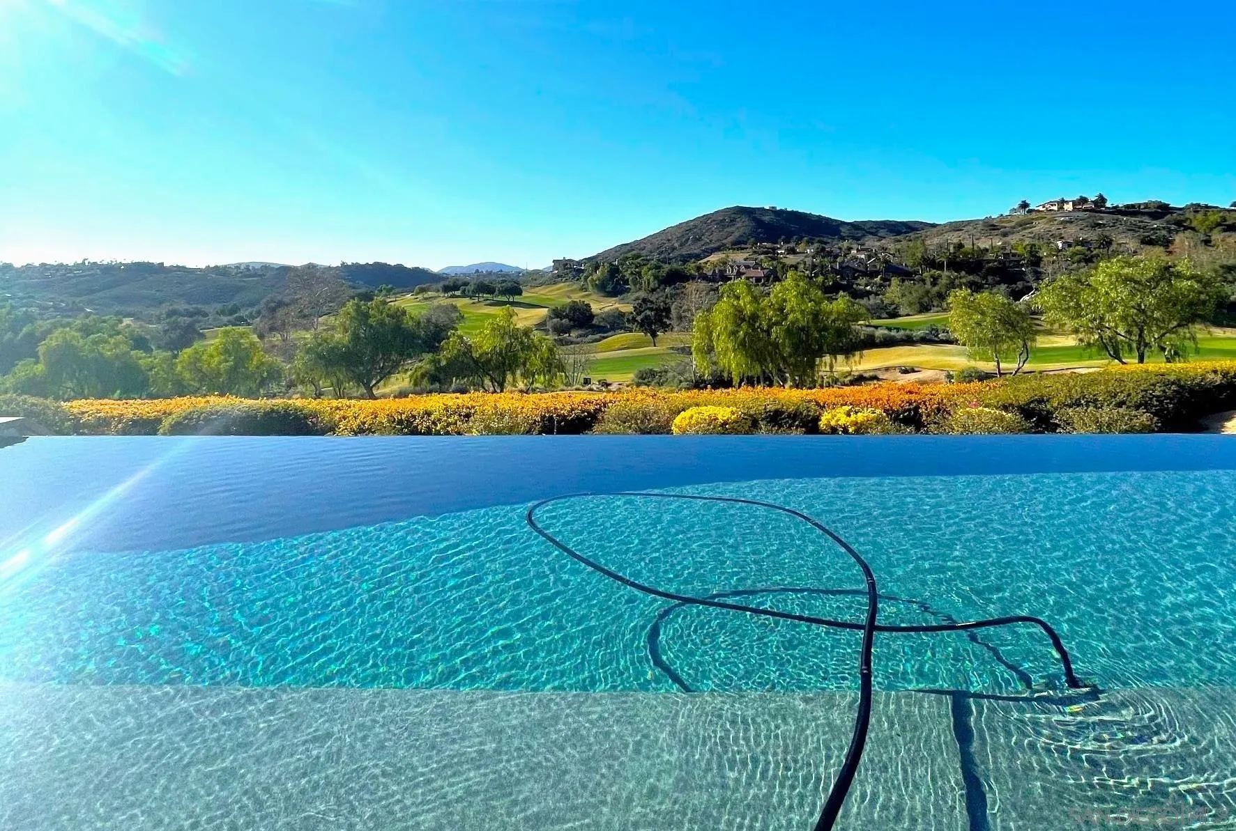18210 Old Coach Drive Poway, CA 92064 - Photo 3 of 5 a view of a lake with a mountain in the background