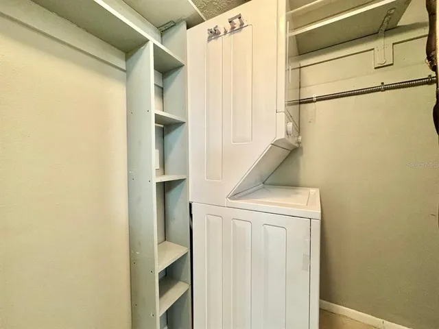 a view of pool with bench and bench