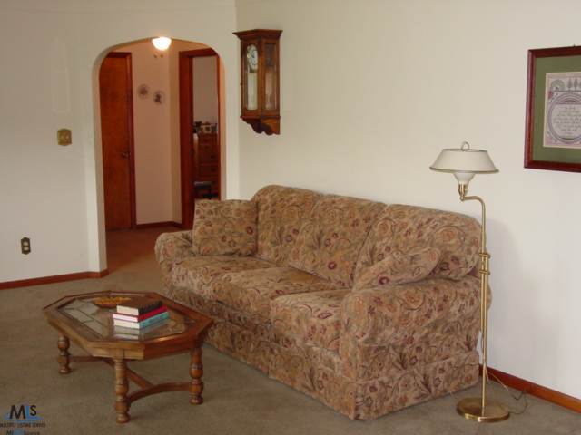 62 West Lapeer Road Peck, MI 48466 - Photo 10 of 25 This is a view of the living room.