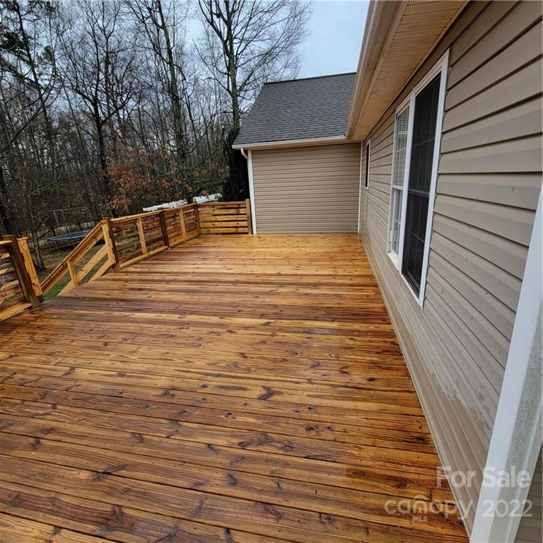 1744 Furnace Road Lincolnton, NC 28092 - Photo 12 of 15 a backyard of a house with wooden floor