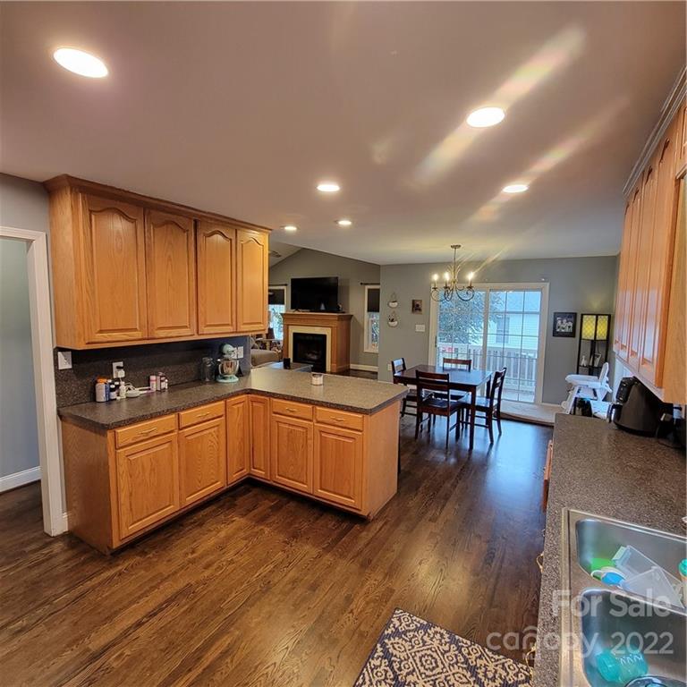 1744 Furnace Road Lincolnton, NC 28092 - Photo 4 of 15 a kitchen with furniture window and wooden floor