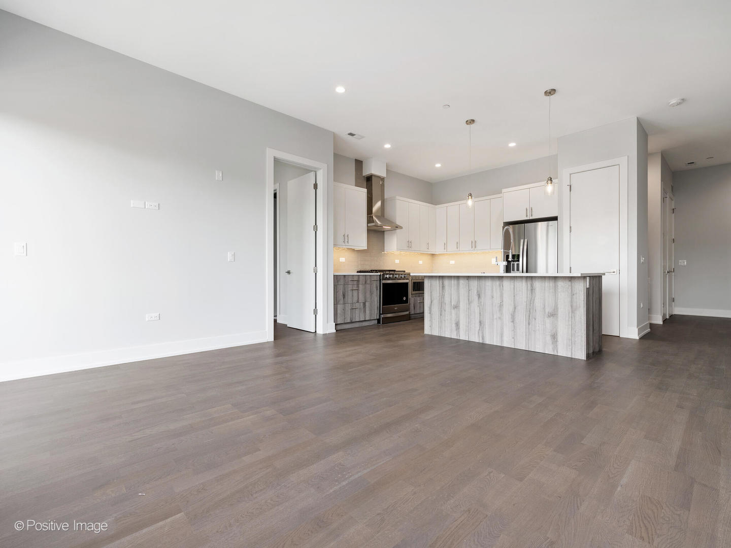 2139 West Madison Street, Unit 212 Chicago, IL 60612 - Photo 5 of 11 a view of a kitchen with a sink and cabinets