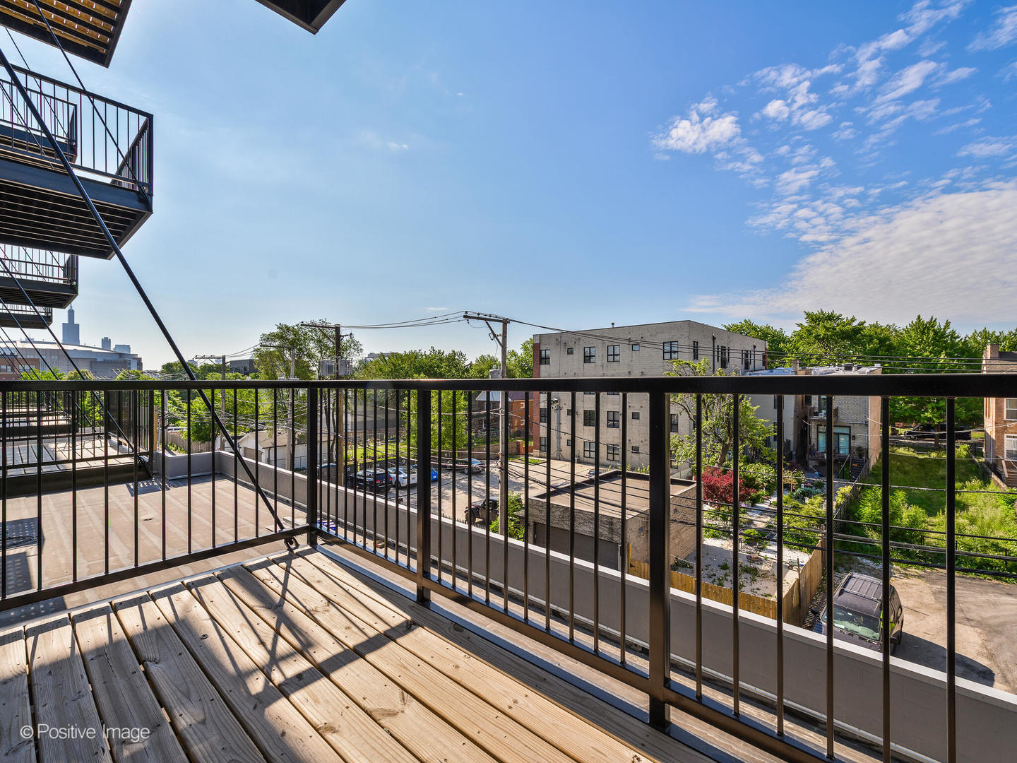 2139 West Madison Street, Unit 212 Chicago, IL 60612 - Photo 10 of 11 a view of city from a balcony