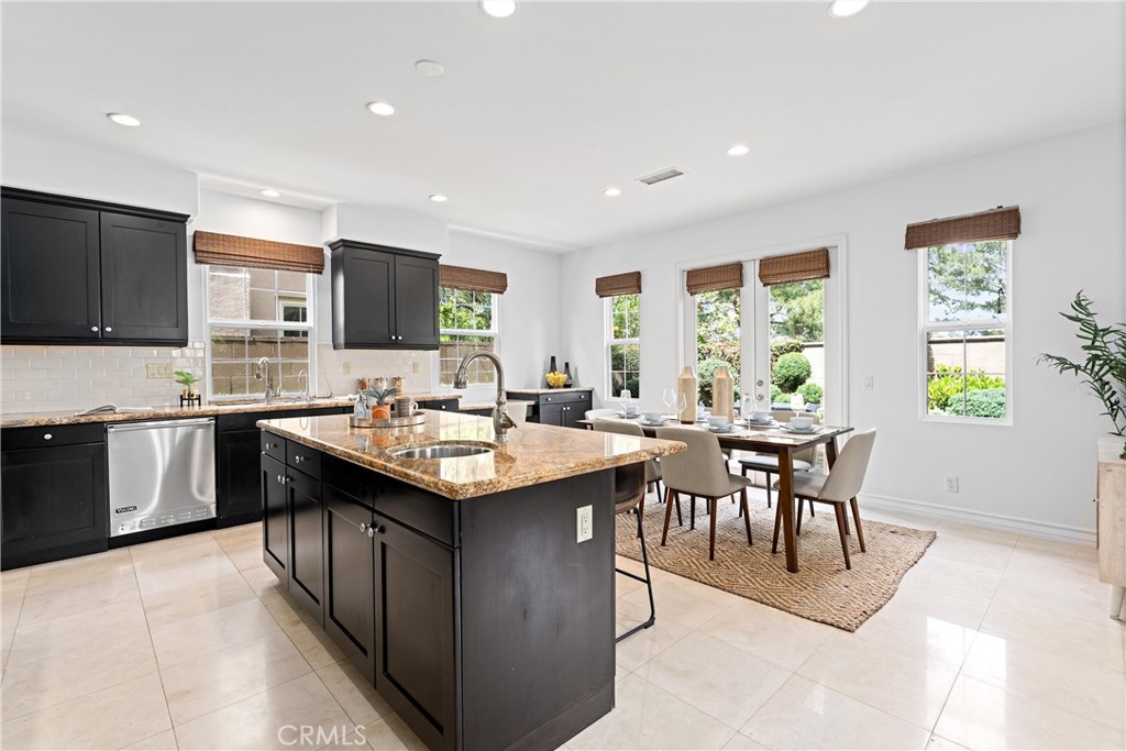 25 Longvale Irvine, CA 92602 - Photo 14 of 58 a kitchen with a sink and stove