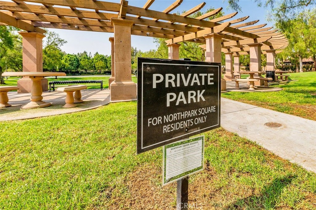 25 Longvale Irvine, CA 92602 - Photo 51 of 58 a view of a street sign under a large tree