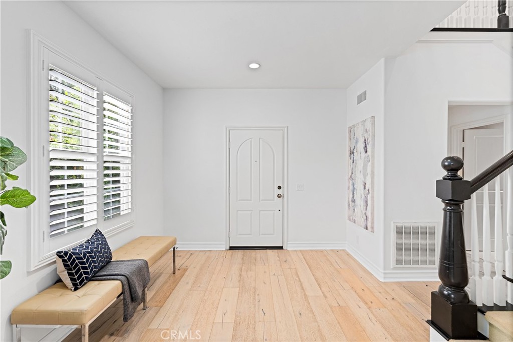25 Longvale Irvine, CA 92602 - Photo 9 of 58 a view of a livingroom with furniture and windows