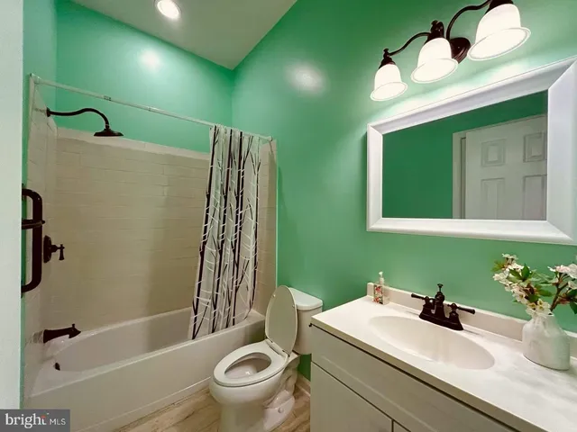 a bathroom with a sink and a window