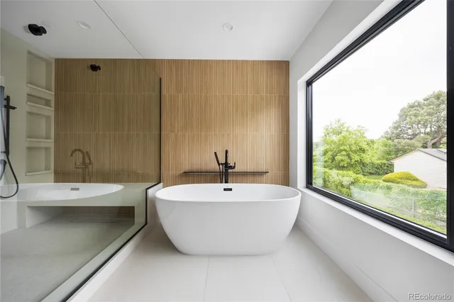 a bathroom with a bathtub and sink