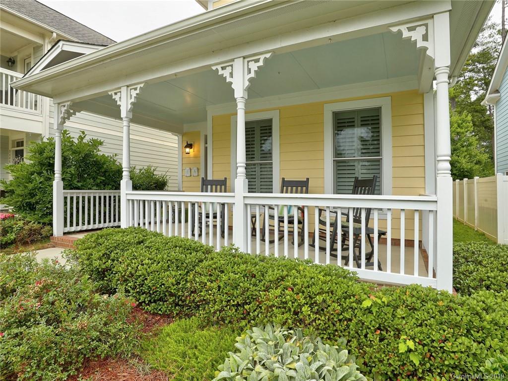 3462 Richard's Crossing Fort Mill, SC 29708 - Photo 3 of 42 a view of a porch with a floor to ceiling window and wooden fence